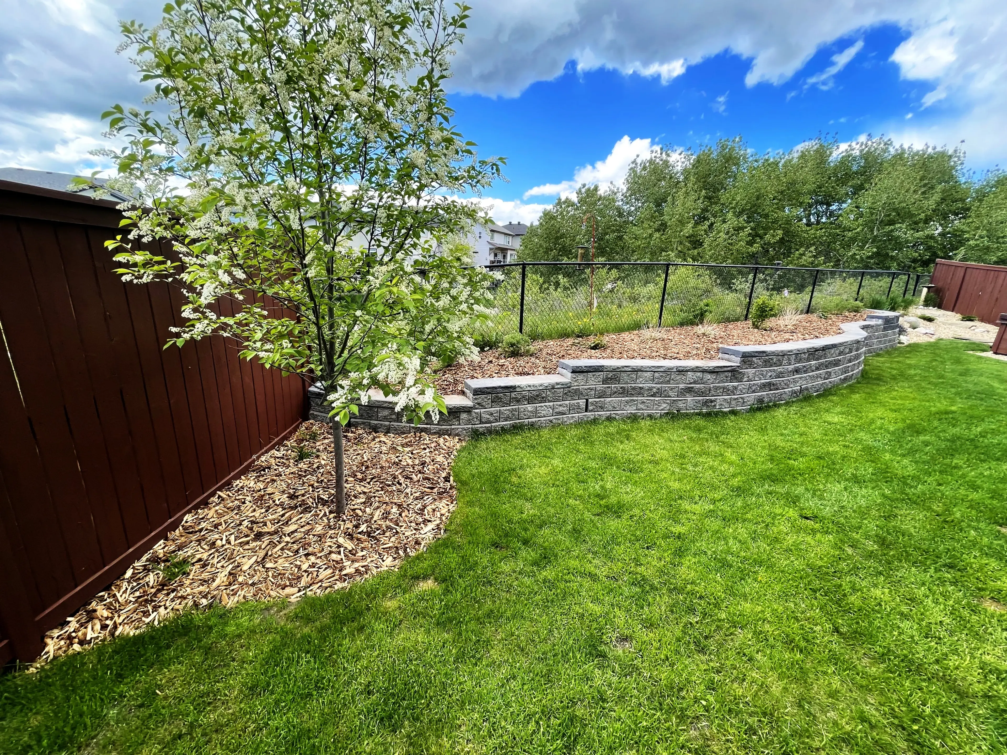 Landscaping crew preparing equipment before service