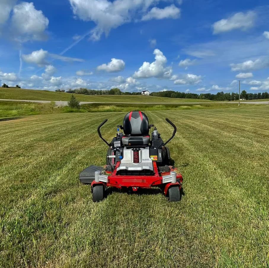 Professional crew providing lawn maintenance service in Calgary, Alberta